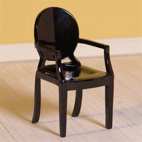 The victoria ghost chair is both lightweight and strong, with an elegant rounded back that beautifully complements square and rectangular dining tables. The Dolls House Emporium Black Ghost Chair