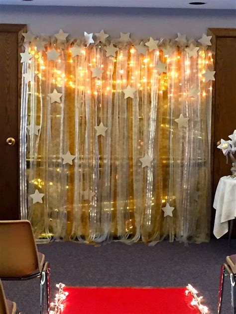 A collection of decorations of all kinds of stars. Christmas Bay Decoration Themes In Office - Hallow Keep Arts