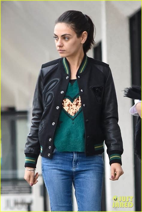 Mila Kunis Rocks A Festive Sweater While Hanging With A Friend In