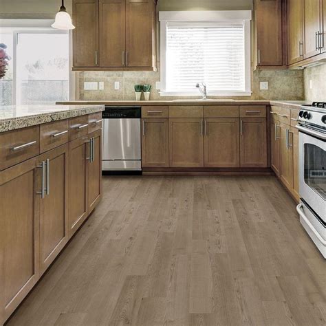 Lvp is fairly simple to install, and homeowners with a penchant for diy projects can save even more by laying the flooring themselves. TrafficMaster Adeline Oak 6 in. x 36 in. Luxury Vinyl Plank Flooring (24 sq. ft. / case)-82313 ...