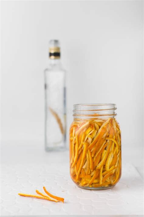 Making Orange Extract Orange Peel In A Glass Jar Stock Photo Image