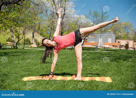 Woman Practices Yoga In Nature Pose Stock Image Image Of Yoga