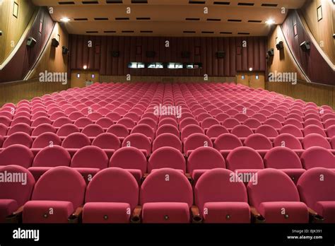 Interior Of Cinema Auditorium With Walls And Ceiling Decoration And