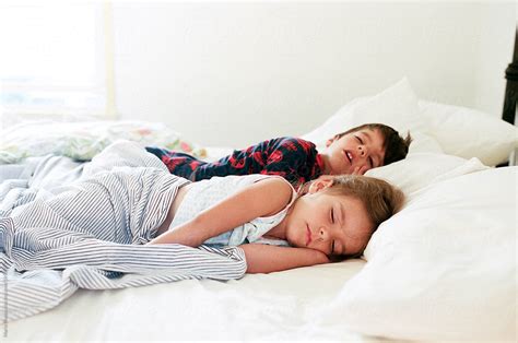 Kids Sleeping In Bed By Maria Manco Stocksy United