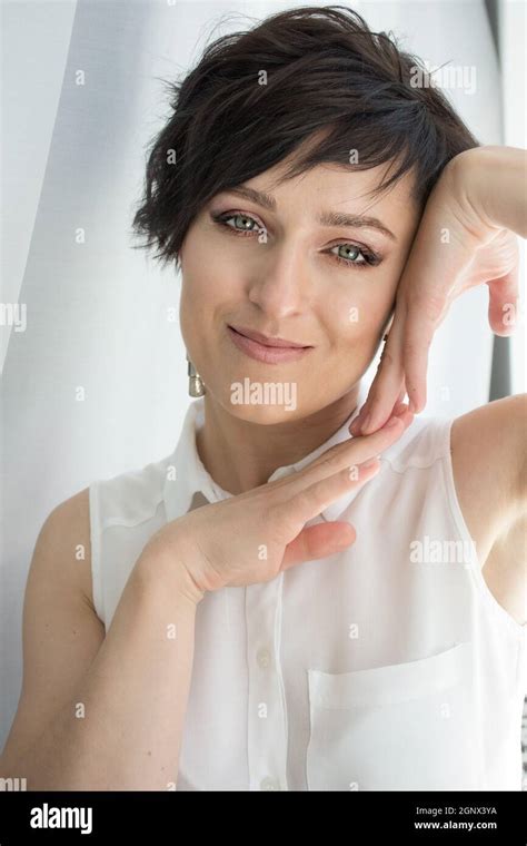 Close Up Tender Portrait Of A Female Face Short Haired Brunette Stock