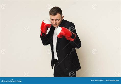 Businessman In Red Boxing Glove Punch To The Goal Stock Photo Image