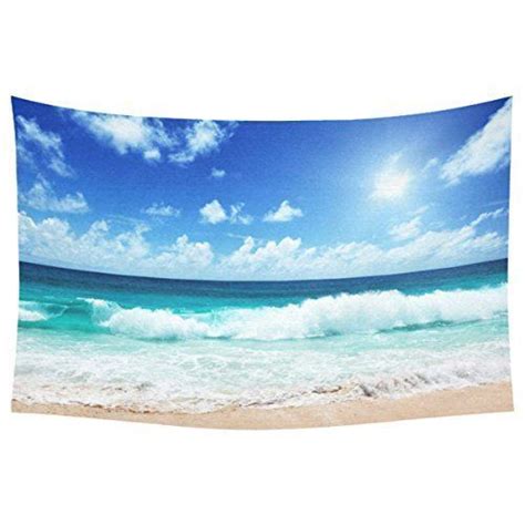 Printed on a microfiber fabric and hung between two wooden hangers, this lightweight, easy to hang piece is ideal for any wall space. JIW.CO (With images) | Beachfront decor, Beach wall hanging, Beach wall tapestry