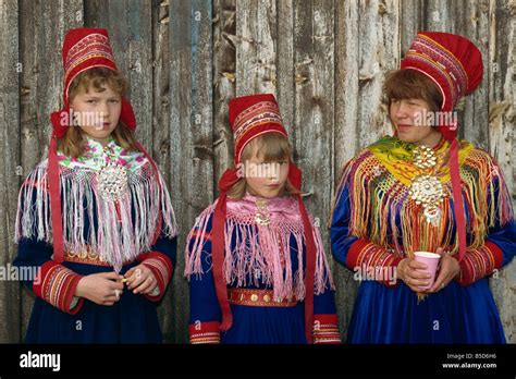 Portrait Of Sami Girls Lapps In Traditional Costume For Indigenous