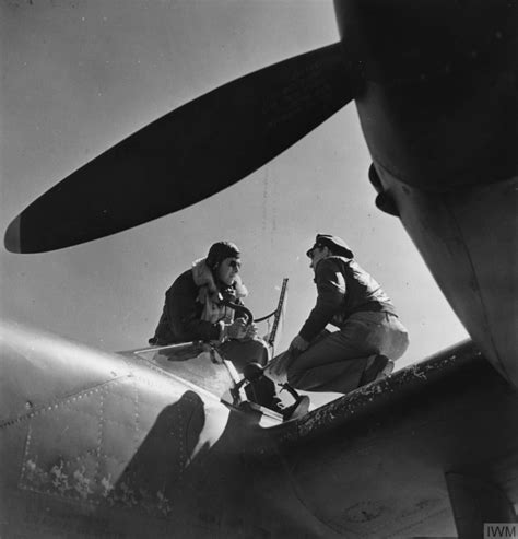 Asisbiz USAAF F Lightning AF PG Operations Officer Briefs A F Lightning Pilot Before A