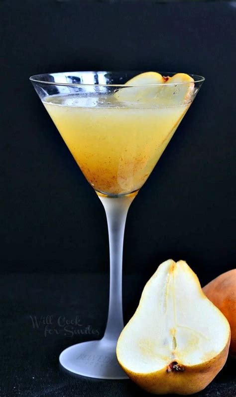 The Pear Martini Is In A Tall Martini Glass The Liquid Is Yellow Ish