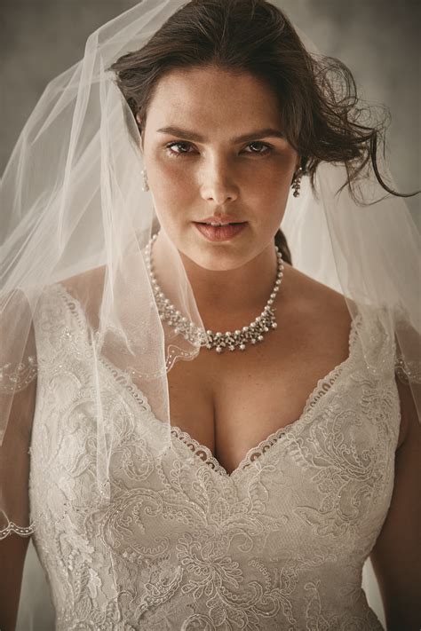 your jaw will drop when you see who made these gorgeous plus size wedding gowns plus size