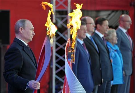 Putin Receives Flame For Russias Olympic Games World News