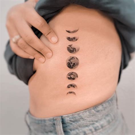 Moon Phases Tattoo Located On The Rib