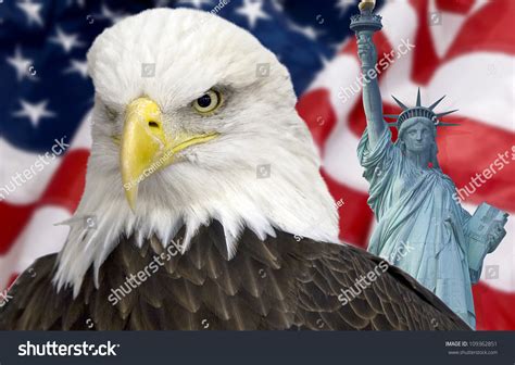 Bald Eagle With Statue Of Liberty And The American Flag Out Of Focus
