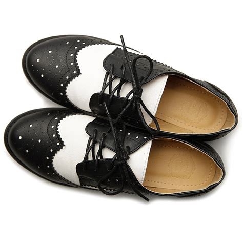 Buy Womens Black And White Wingtip Shoes In Stock