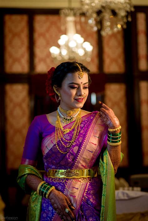 Photo Of A Marathi Bride In A Purple Saree With Gold Jewellery