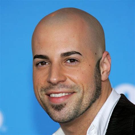 A Bald Head Gives A Youthful Appearance Dark Eyebrows Sideburns