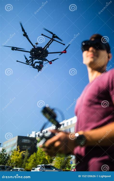 Handsome Young Man Flying A Drone Outdoors Stock Photo Image Of