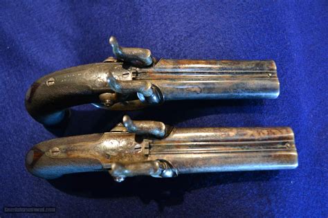Cased Pair Of Double Barrel Percussion Pistols Mint
