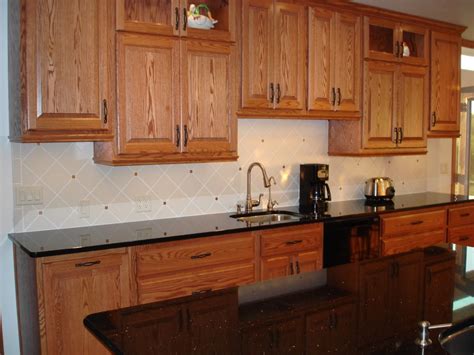 The kit has enough material and accessorries to make 3 average size repairs. backsplash pictures with Oak cabinets and uba tuba granite | RE: backsplash with Uba Tuba coun ...
