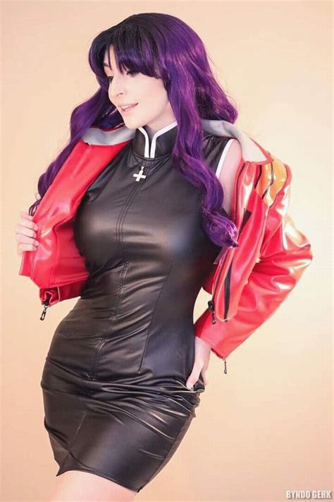 A Woman With Purple Hair Wearing A Black Leather Dress