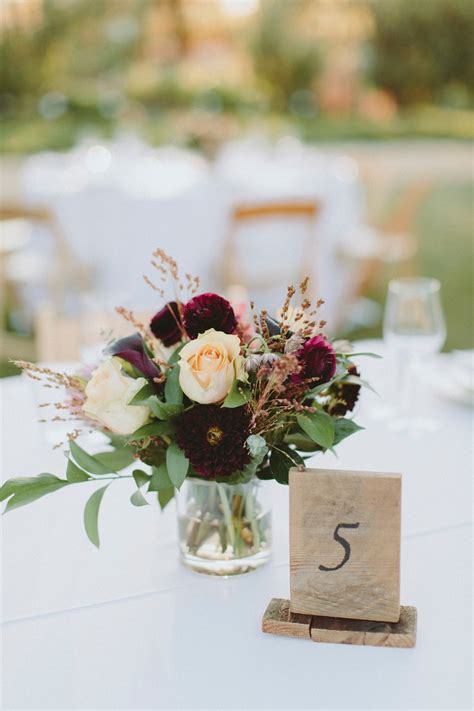 Ideas for wedding centerpieces without flowers. A Modern Chic Outdoor Ranch Wedding in Burgundy and Navy