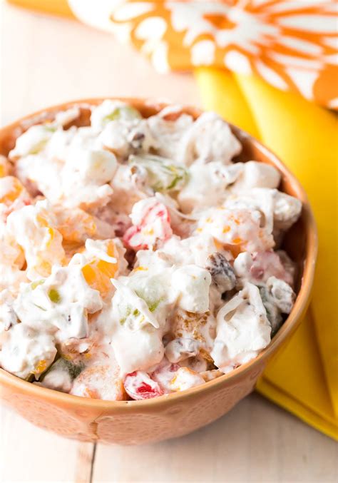 Add the marshmallows, coconut, and sour cream. Grandma's Best Ambrosia Salad (Recipe) - A Spicy Perspective