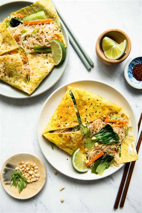 Add the noodles back to the wok and toss them well, loosening them with tongs or a pair of chopsticks. Egg-Wrapped Stir Fry Noodles | Healthy Nibbles