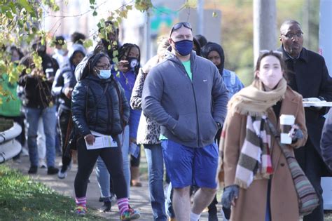 Workers sort out a few pieces of regular mail mixed in with the ballots. Voter turnout in Democratic-hotbed Cuyahoga County tops ...