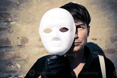 Man behind the mask. 11400567 Stock Photo at Vecteezy