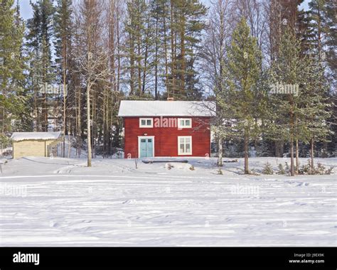Snowy Landscape With A Log Cabin And Fir Forest Hi Res Stock