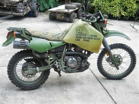 A larger 300mm front disc with optional abs should help. A Different Shade of Green - Kawasaki KLR650 | Bike-urious