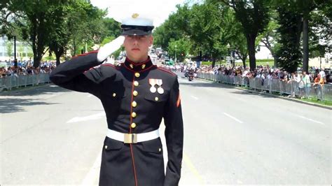 Marines In Uniform Saluting
