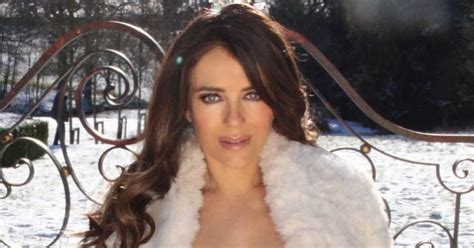 Liz Hurley 55 Floors Fans As She Ditches Bra In Topless Snow Shoot