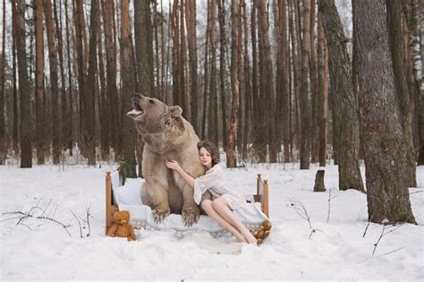 fairytale like photos of russian models posing with a real bear