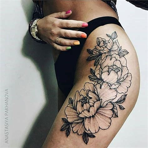 Gorgeous Outline Black Flower Tattoo On The Left Hip And Thigh Tattoo