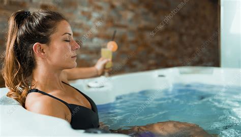 Woman Enjoying Hot Tub In A Spa Stock Image F0270551 Science Photo Library