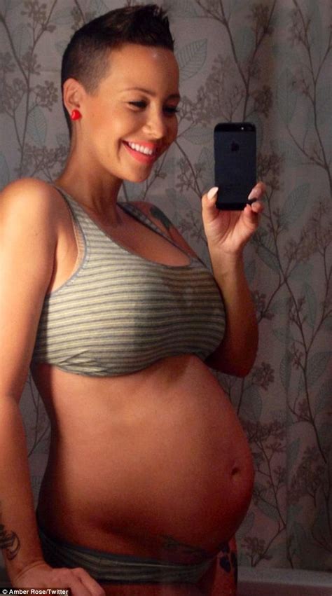 Amber Rose Shows Just How Large Her Baby Bump Is As She Reaches