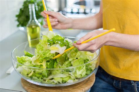 Woman Preparing A Salad Stock Image C0341667 Science Photo Library