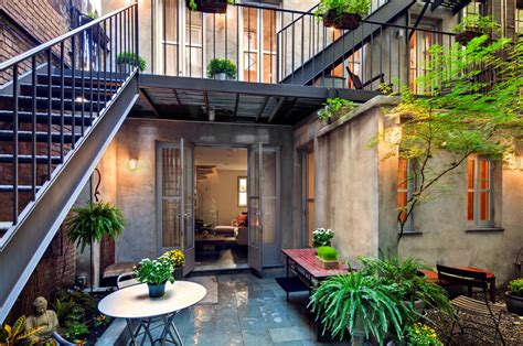 Avenues lined with glamorous shops and authentic restaurants, historic buildings filled with art, and on the upper east side, the surrey hotel was designed by lauren rottet of rottet studio to feel like a new york city townhouse passed down. East Village Carriage House With Modernist Interiors ...