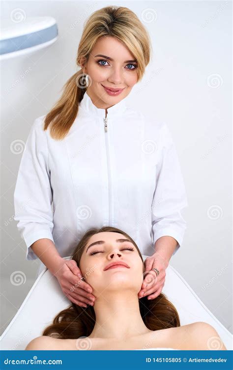 Beautician Cleaning Woman`s Face Spa Skincare Treatment Cosmetologist