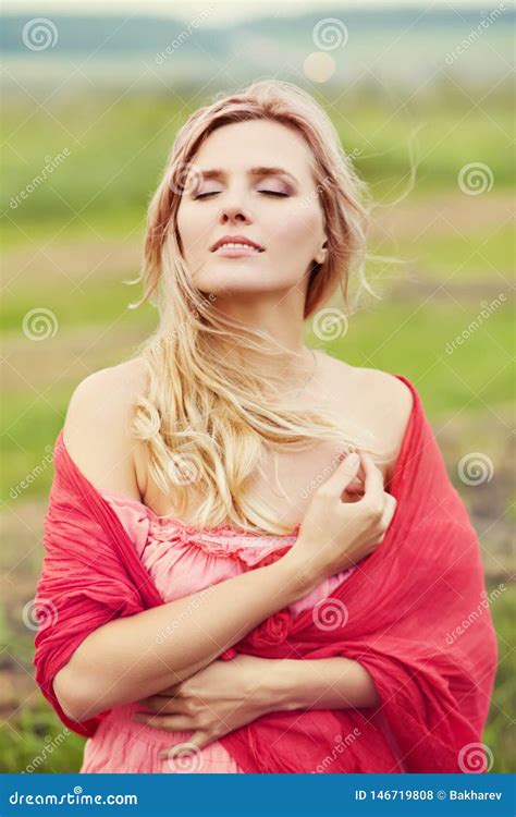 Outdoor Portrait Of A Middle Aged Blonde Woman Stock Photo Image Of