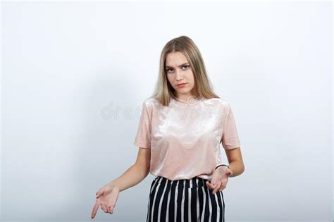 Beautiful Lady Pointing Down With Fingers Showing Advertisement