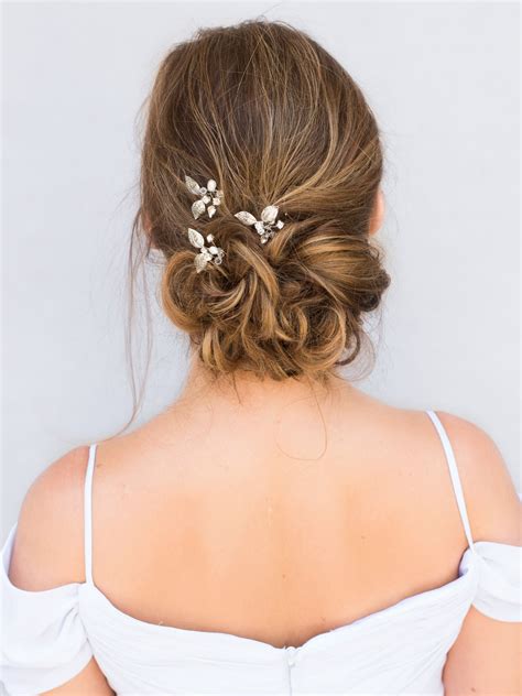 20 Photos Chignon Wedding Hairstyles With Pinned Up Embellishment