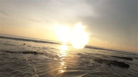 Morning Bath At The Ocean With Beautiful Sunrise At Tunamaya Beach