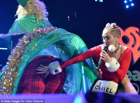 Miley Cyrus Adds New Moves To Racy Jingle Ball Routine As She Spanks