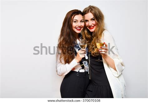 Two Best Friends Girls Having Fun On Black And White Party Drink