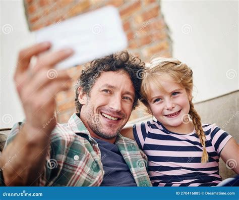 Selfies With My Little Dearest A Father And His Little Daughter Taking A Selfie Together At