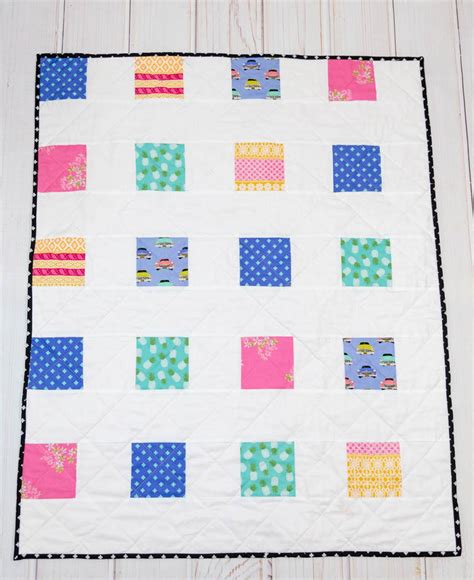 Four Square Simple Charm Pack Baby Quilt | FaveQuilts.com