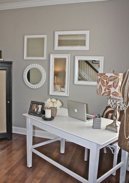 Cool gray paint colors give off a sense of tranquility and serenity. Chic, Girly Office in Cool Neutral Gray - Interiors By Color